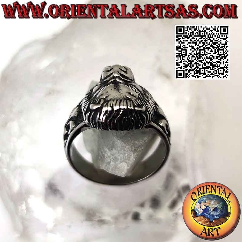 Surgical steel ring (316L), lion head and lily in bas-relief on the sides