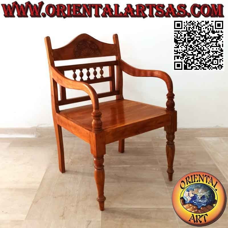 Armchair with carved rosette and small columns on teak wood back