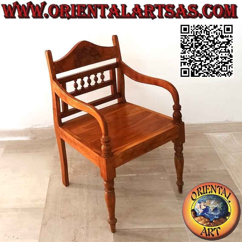 Armchair with carved rosette and small columns on teak wood back