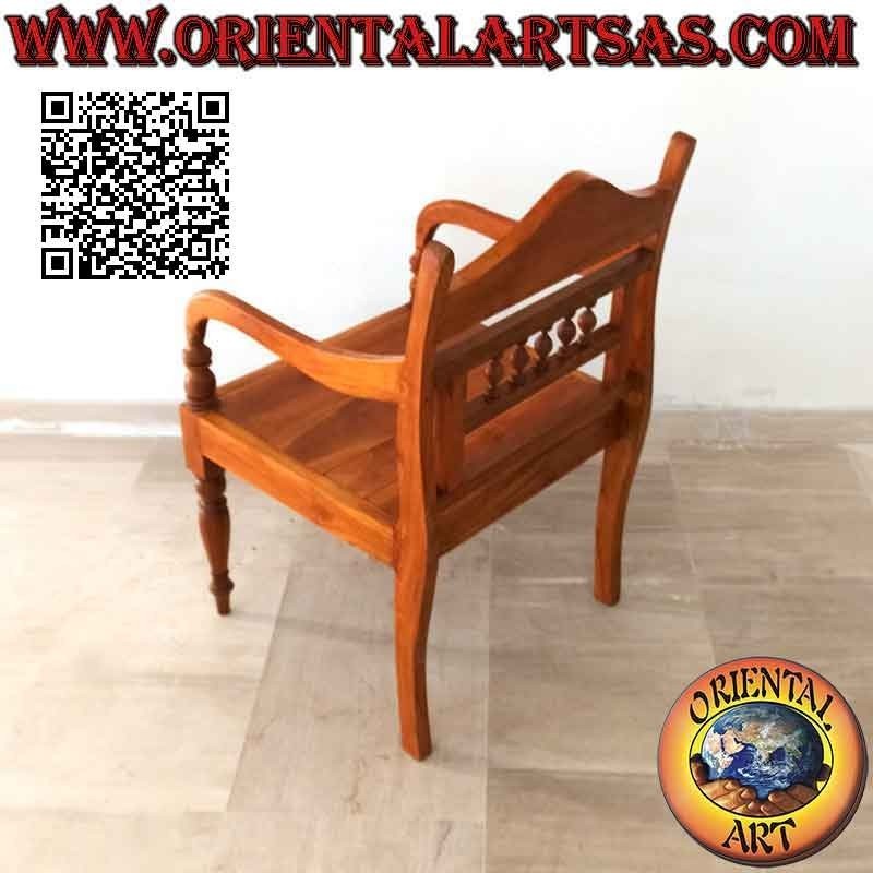 Armchair with carved rosette and small columns on teak wood back