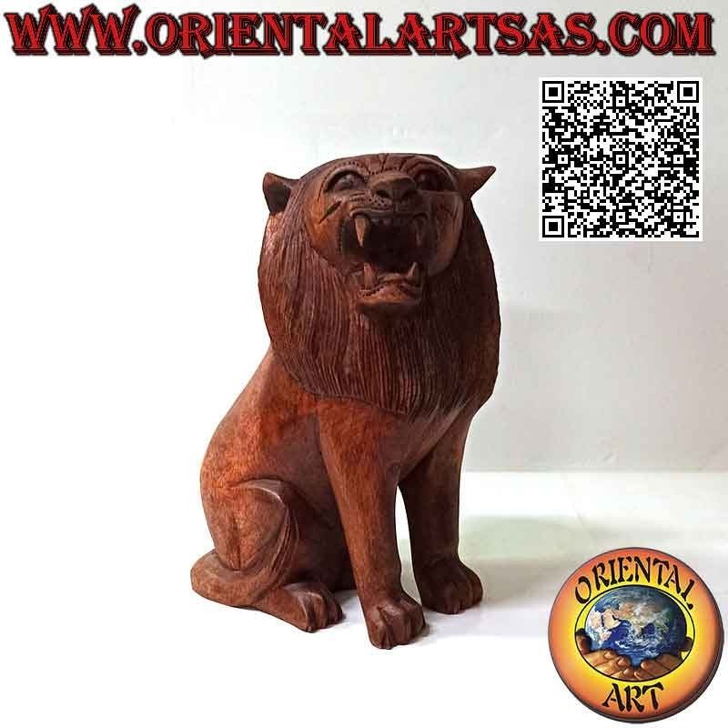 22 cm sculpture of a sitting lion in suar wood (hand carved from a single block)