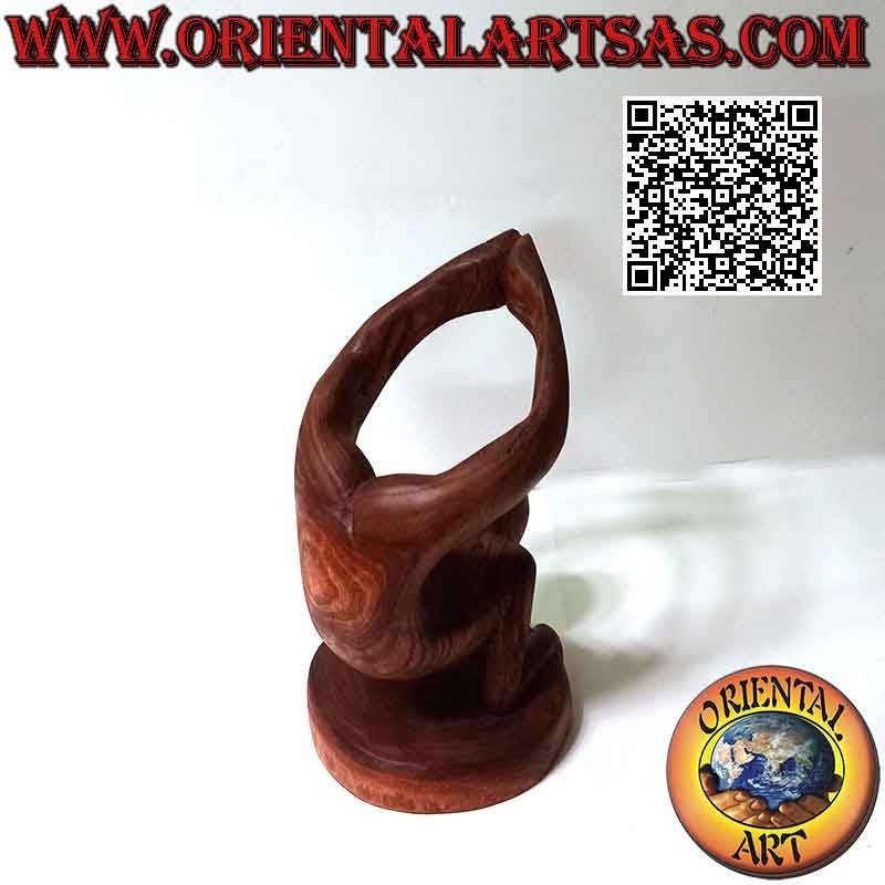 Escultura portabotellas de acróbata en posición artística en madera de Suar