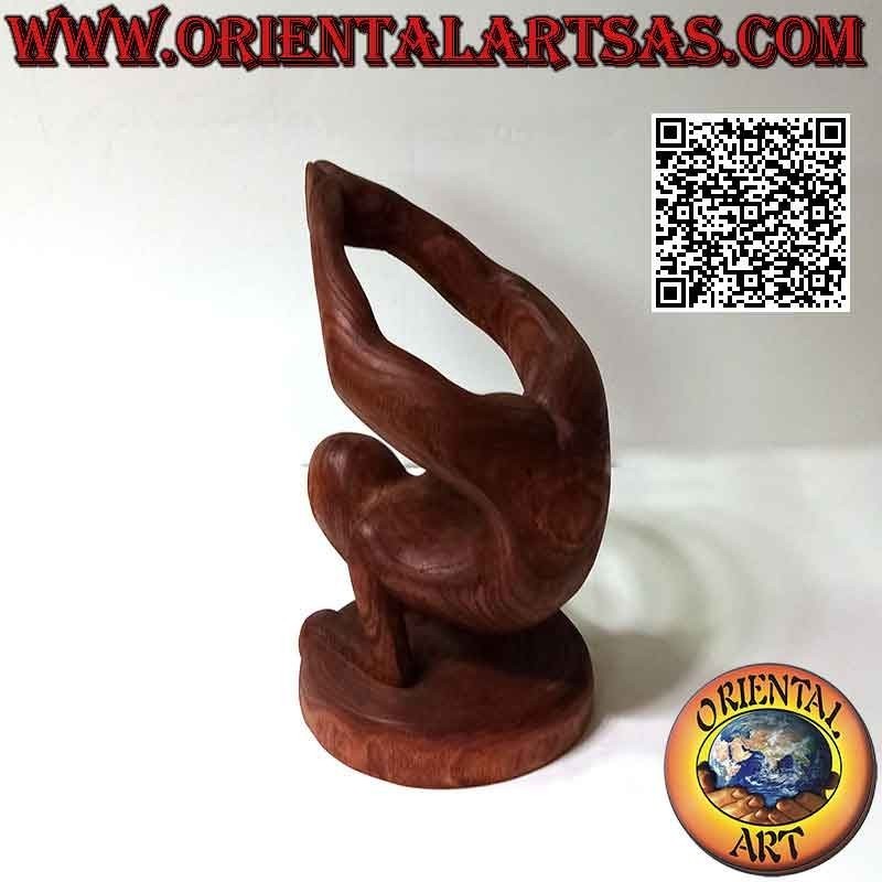 Bottle holder sculpture of an acrobat in artistic position in Suar wood