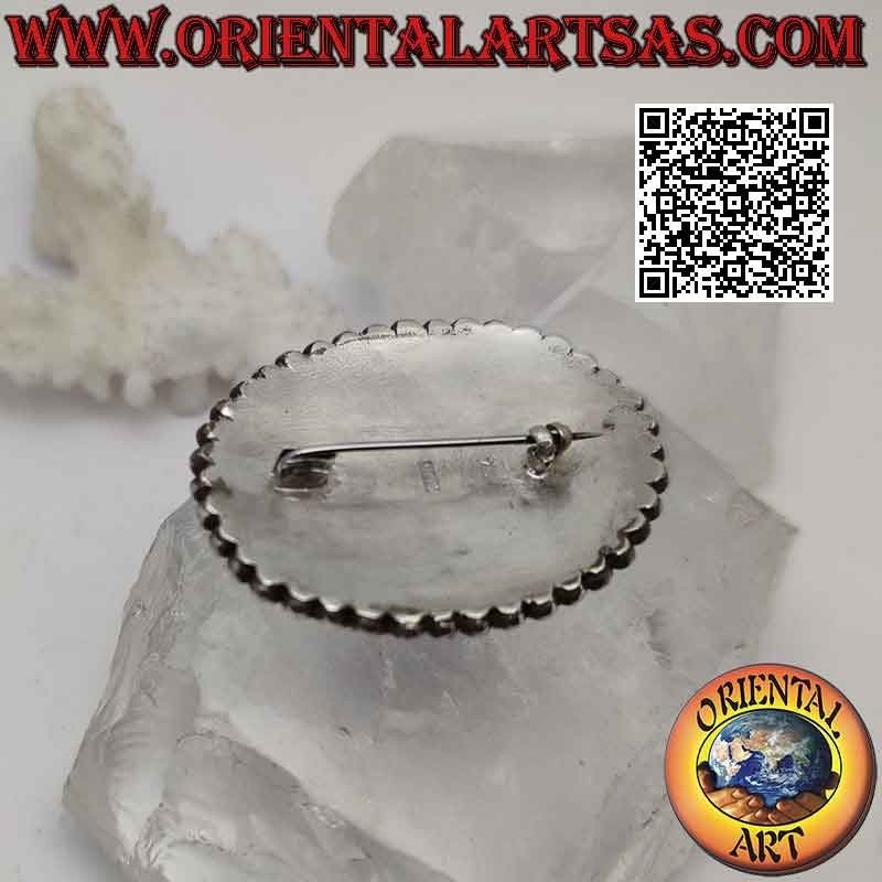 Broche de plata 925 ‰ con gran cabujón ovalado de ónix rodeado de dos filas de bolas en crecimiento