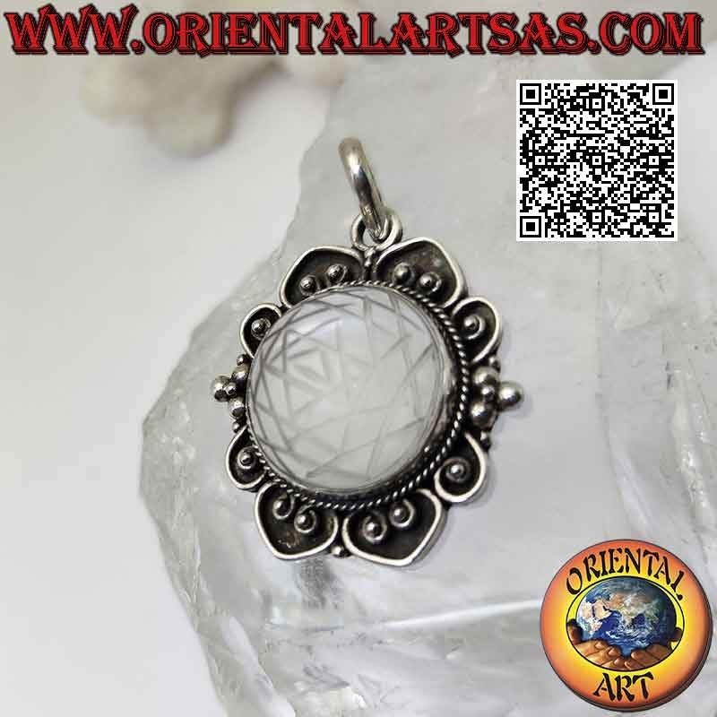 Silver pendant with Sri Yantra mandala engraved on round cabochon rock crystal on baroque setting