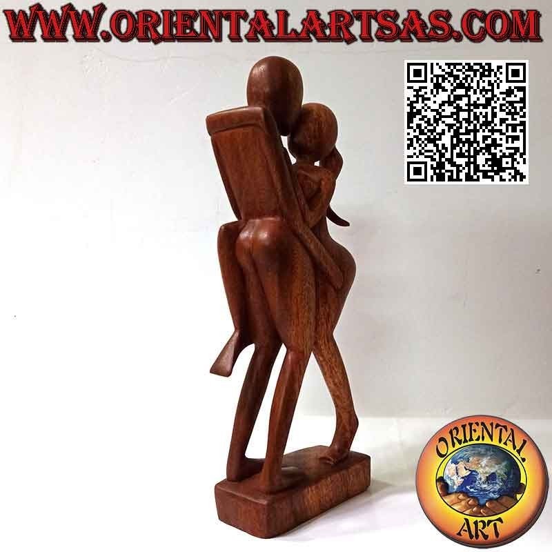 Abstract style "passionate kiss" sculpture in suar wood, 38 cm (dark)