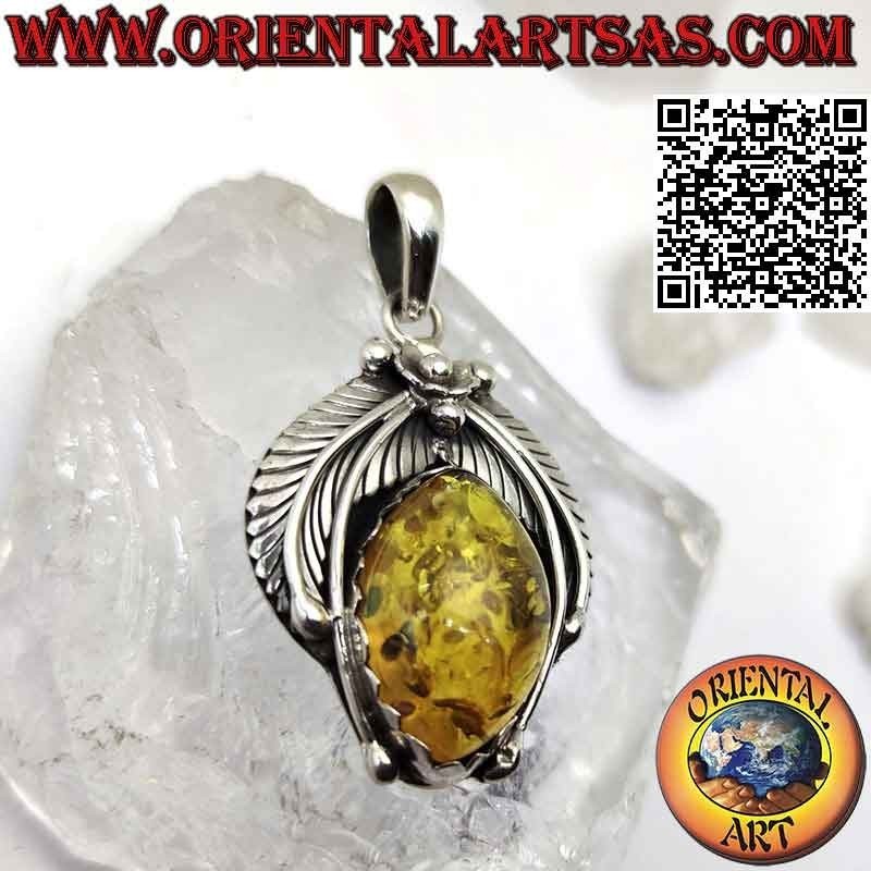 Silver pendant with large cabochon shuttle amber with crown of leaves and central flower