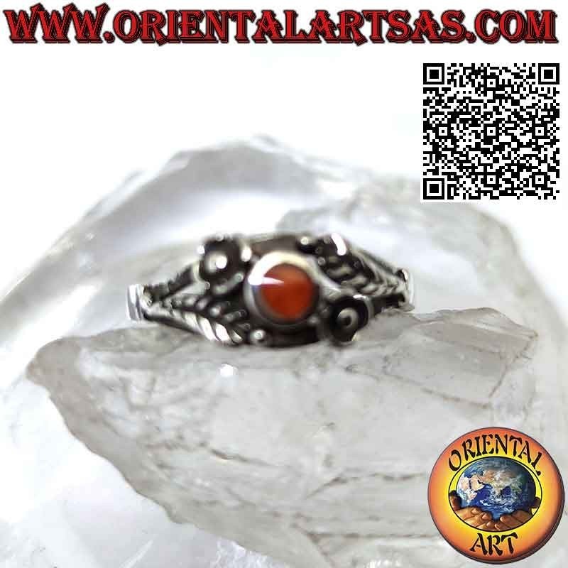 Silver ring with round Carnelian, asymmetrical flower and leaf decorations on the sides
