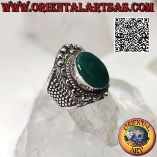 Wide band silver ring with large oval green agate with baroque crown and balls around