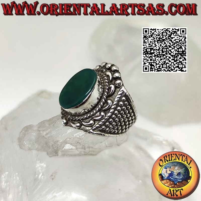 Wide band silver ring with large oval green agate with baroque crown and balls around