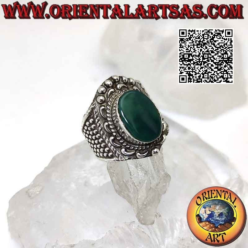 Wide band silver ring with large oval green agate with baroque crown and balls around
