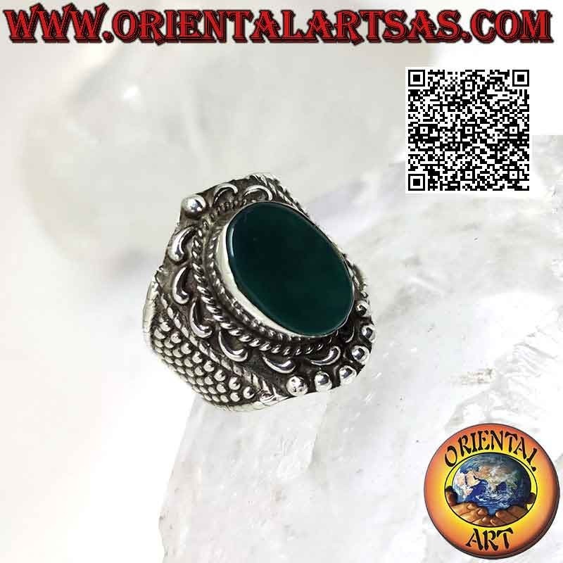 Wide band silver ring with large oval green agate with baroque crown and balls around