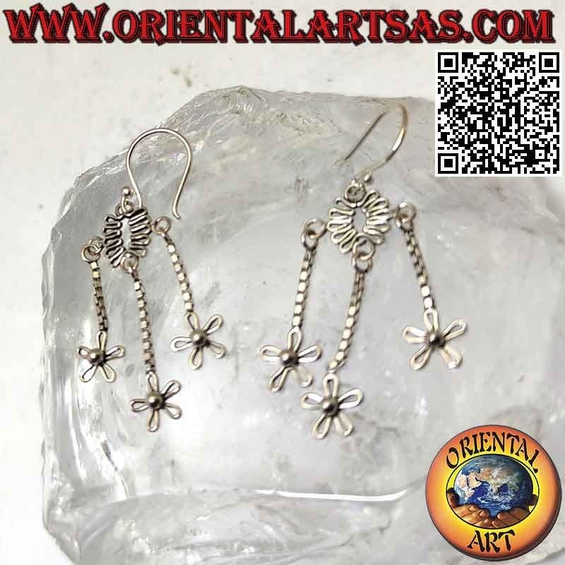 Silver hook earrings with wavy oval wire and three hanging flowers