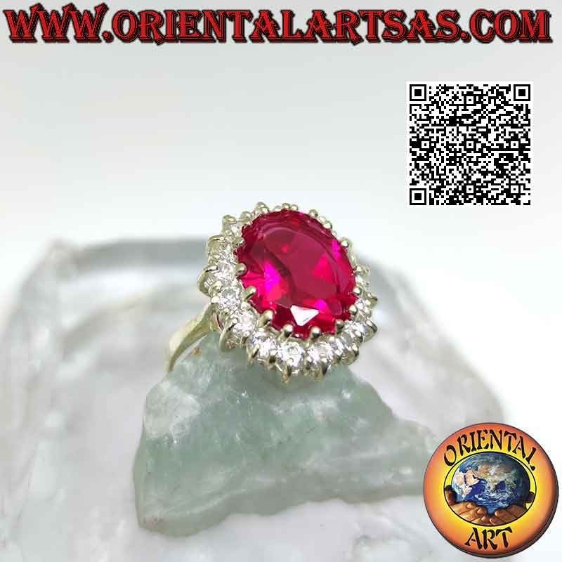 Silver ring with large oval synthetic ruby set surrounded by round white zircons