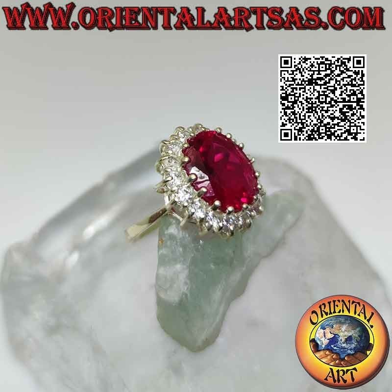 Silver ring with large oval synthetic ruby set surrounded by round white zircons