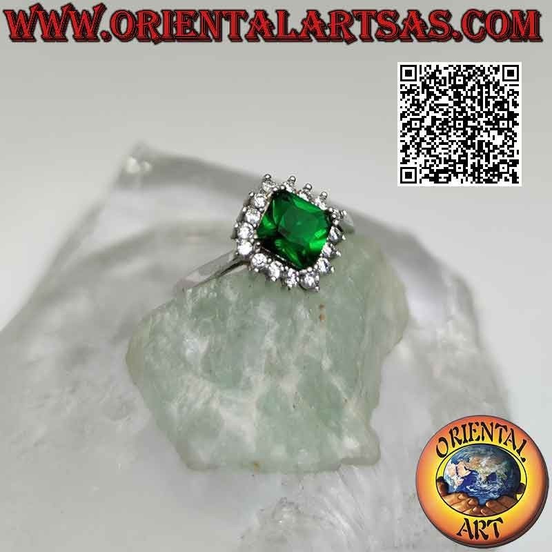 Solitaire silver ring with square rhomboid synthetic emerald set surrounded by white zircons