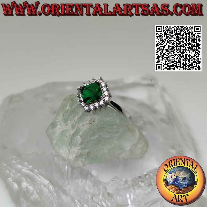 Solitaire silver ring with square rhomboid synthetic emerald set surrounded by white zircons