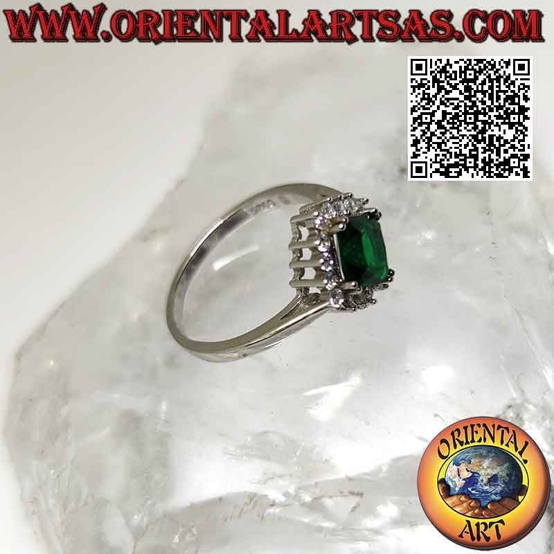 Solitaire silver ring with square rhomboid synthetic emerald set surrounded by white zircons