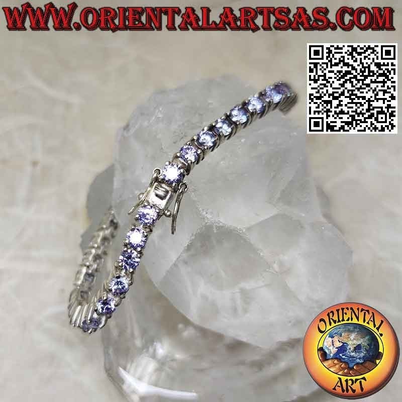 Tennisarmband in 925 ‰ Silber mit 4 mm gefassten lavendelfarbenen Zirkonen