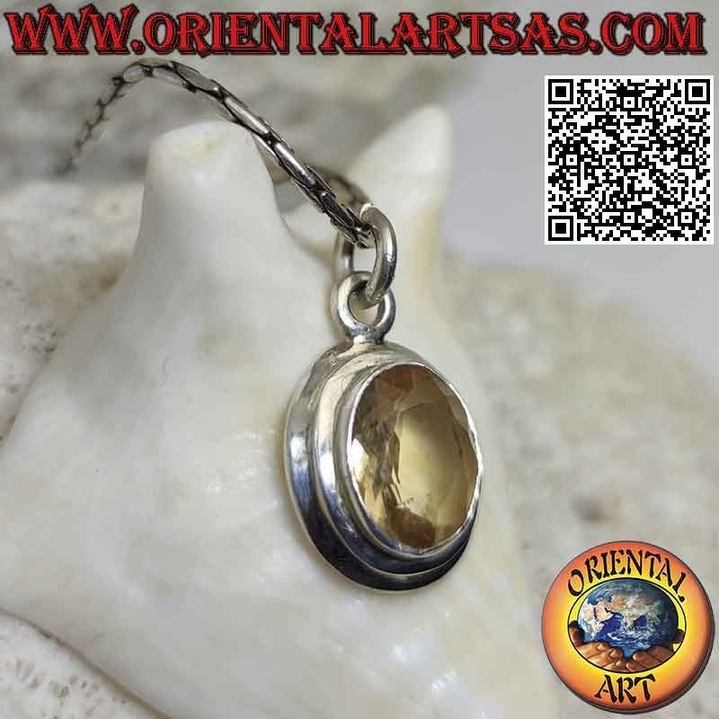 Silver pendant with natural oval yellow topaz on simple setting with sloping edge