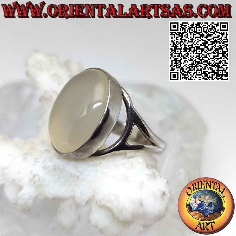 Silver ring with oval cabochon moonstone on a smooth setting of sinuous lines