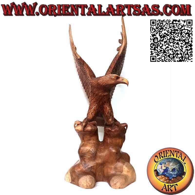Golden eagle sculpture with spread wings standing on the 80 cm suar wood promontory