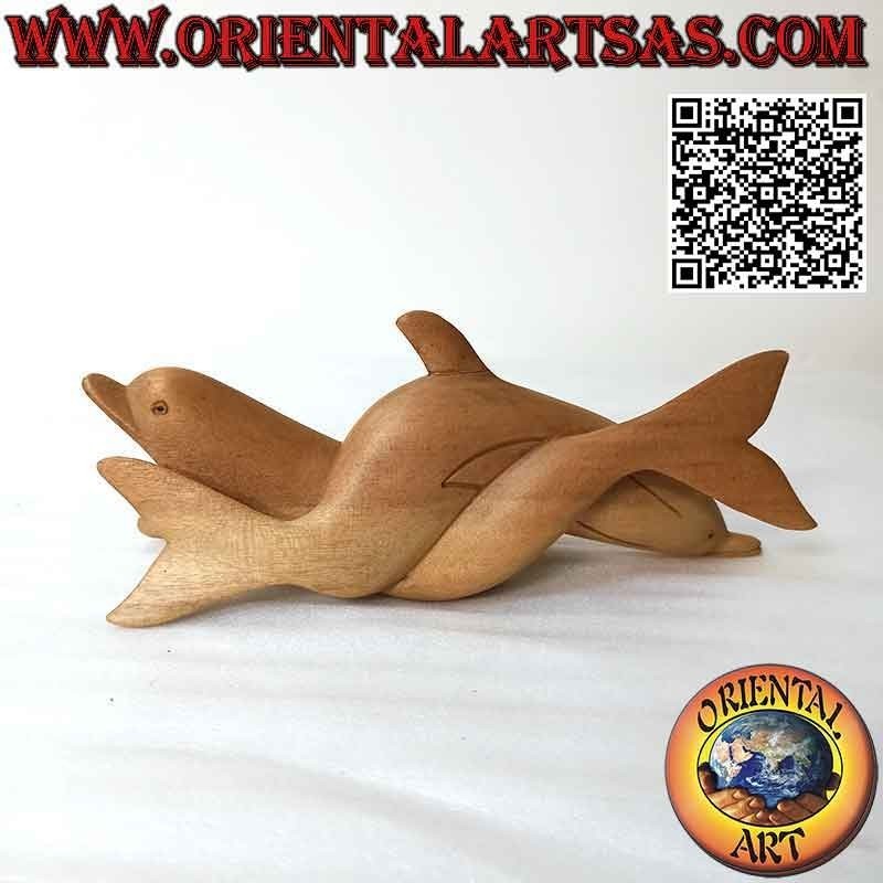 Scultura di una coppia di delfini intrecciati tra loro in legno di ibisco da 20 cm