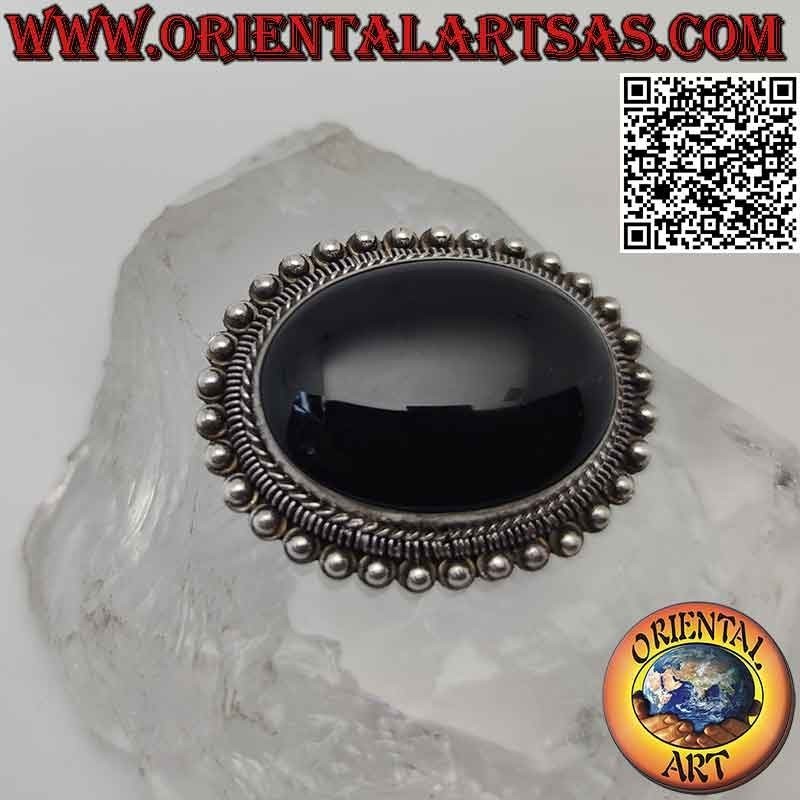 Spilla in argento 925 ‰ con onice ovale grande cabochon contornata da intreccio, anellini e palline