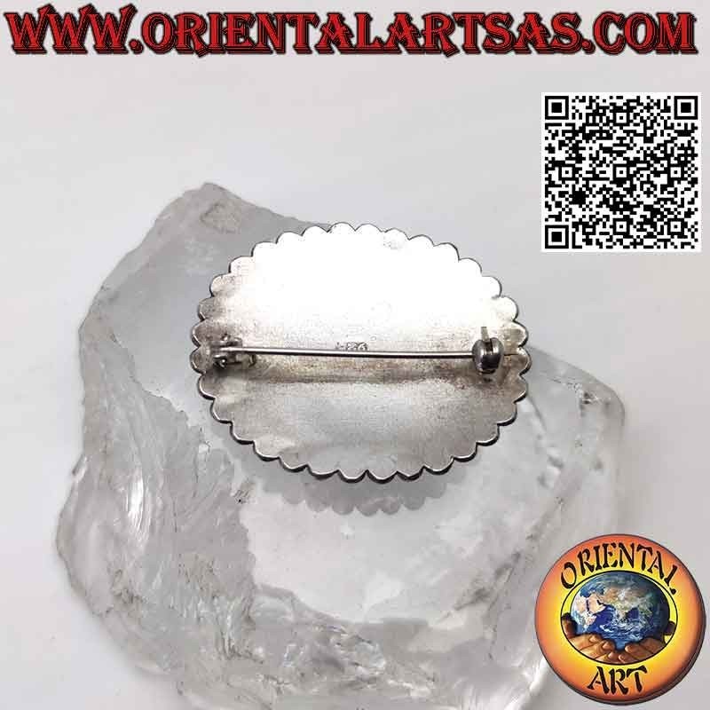 Broche de plata 925 ‰ con gran cabujón ovalado de ónix rodeado de entretejidos, anillos y bolitas