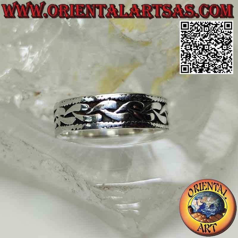Silver ring with worked band, surreal flat chain in bas-relief