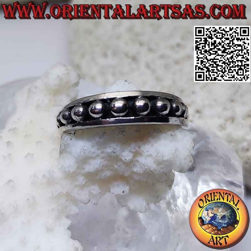 Anillo de plata con banda creciente con bolas lisas en alto relieve