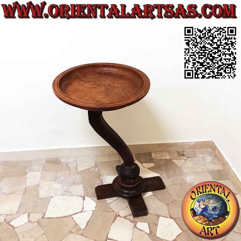 Round coffee table with decentralized top on curved axis in antique teak wood