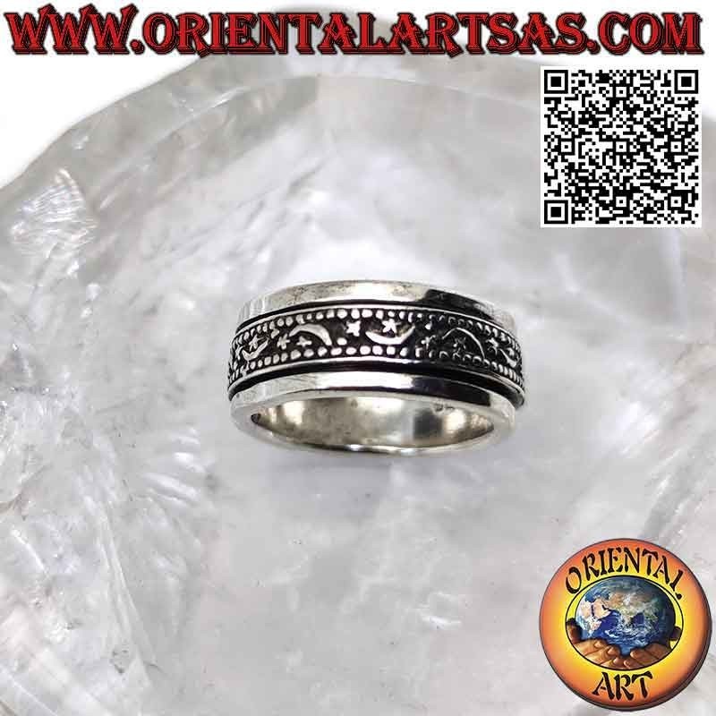 Silver ring with antistress band, moons and stars alternating in bas-relief