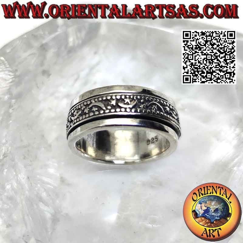 Silver ring with antistress band, moons and stars alternating in bas-relief