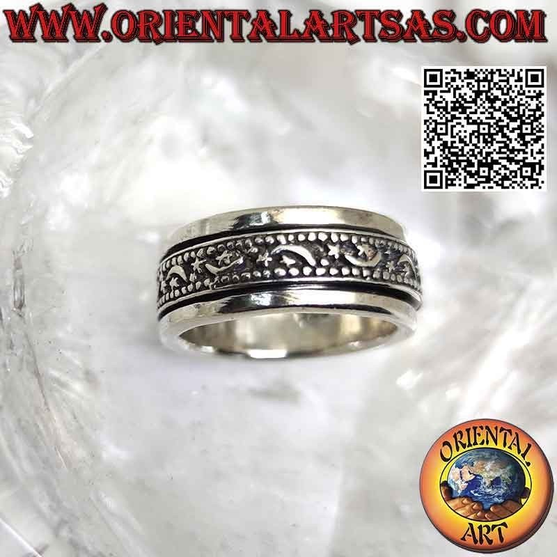Silver ring with antistress band, moons and stars alternating in bas-relief
