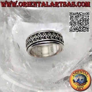 Anillo de plata con banda antiestrés, línea entrelazada con bucles alternados en bajorrelieve