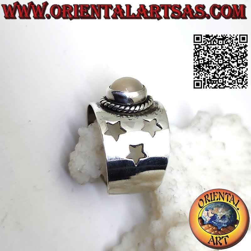 Silver band ring with oval cabochon moonstone and pierced stars