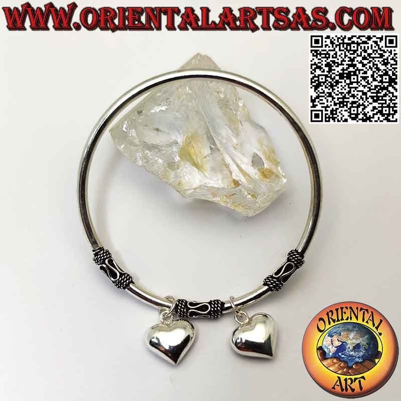 Charms bracelet in 925 ‰ silver, rigid and smooth with three fixed serpentine spacers and two rounded hearts
