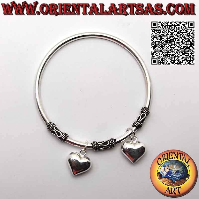Charms bracelet in 925 ‰ silver, rigid and smooth with three fixed serpentine spacers and two rounded hearts