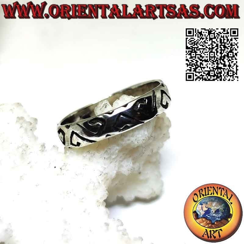 Silver ring with worked band with engraved tringular spirals decoration