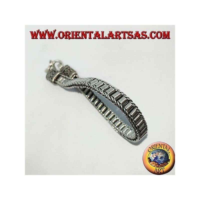Flat silver bracelet with central spirals