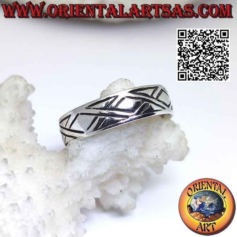 Silver band ring worked with engraved rhombuses and broken lines