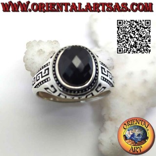 Silver ring with faceted oval spinel and Greek engraved on the sides