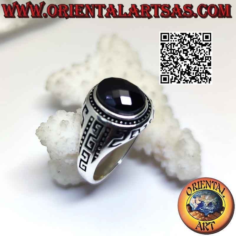 Silver ring with faceted oval spinel and Greek engraved on the sides