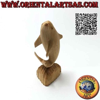 Escultura de madera de hibisco de 12 cm de un delfín posando en el acantilado