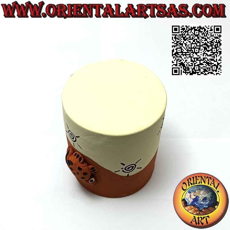Hand made cylindrical pen holder with frog and spirals in terracotta