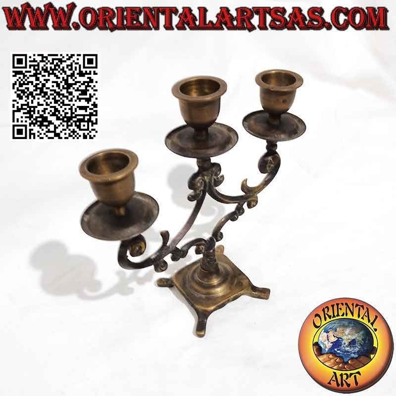 Traditional Nepalese three-armed candle holder in pure brass