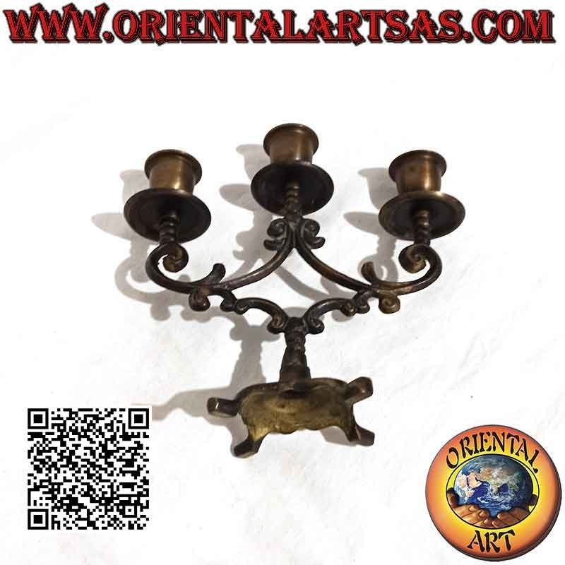 Traditional Nepalese three-armed candle holder in pure brass