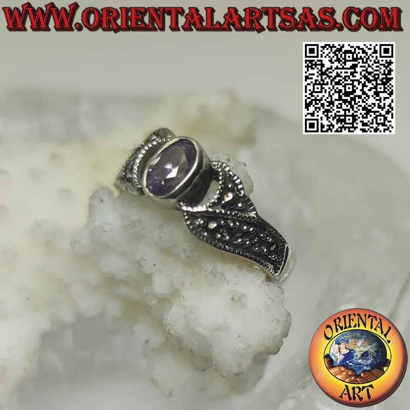 Silver ring with natural oval faceted amethyst and bands studded with marcasite on the sides