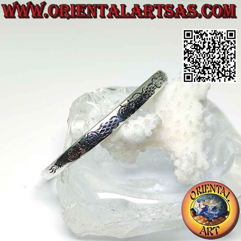 Rigid bracelet in 925 ‰ silver with engraved symmetrical Maori decoration and terminal ball